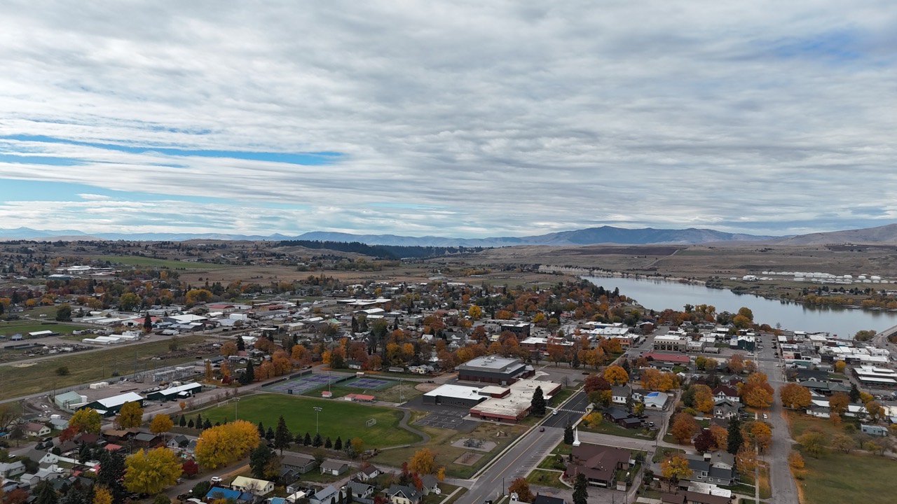 Aerial view of Polson neighborhoods, school grounds, and Flathead Lake.